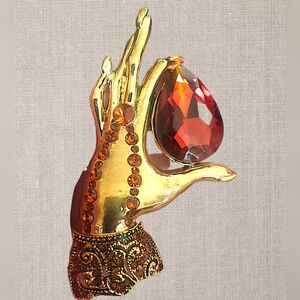 Elegant Gold and Red Hand Brooch